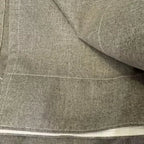 cortina de linho cinza detalhes do acabamento e costura do tecido  finamente trabalhada 