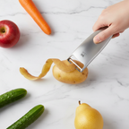 descascador de nox cortador de frutas e legumes utensilio gourmet flat lay descascador inox com legumes