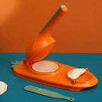 Máquina de fazer pastel 2 em 1 tazmo Mass molde de salgados laranja aberta 